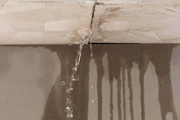 Professional Flood Damage Cleanup technician working in Oakdale, PA